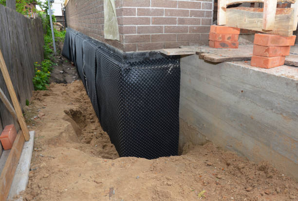 SJ Waterproofing Pros technician performing targeted Sump Pump Installation assessment in Nappanee, IN